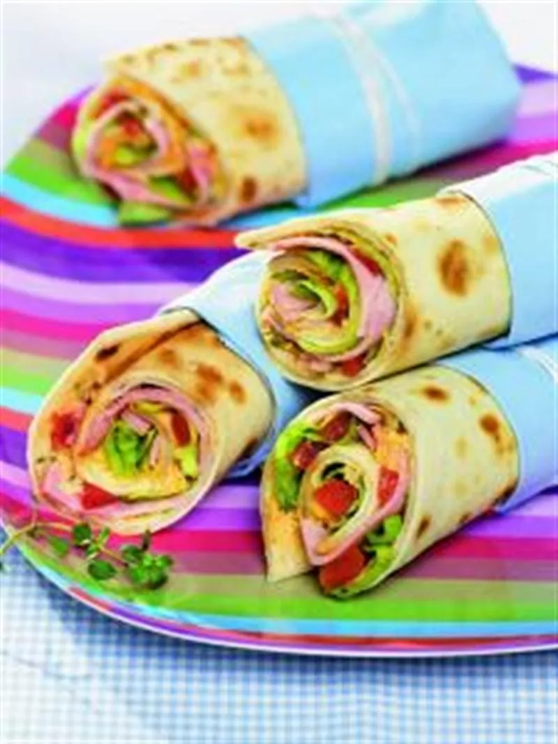 Schinken-Wraps mit  Tomaten-Kapern-Butter